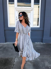 Keep In Touch Wrap Dress